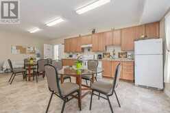 760 WOODHILL Drive Unit# 212 Fergus