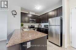 203 - 39 NEW DELHI DRIVE Markham