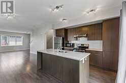 101, 2802 Kings Heights Gate SE Airdrie