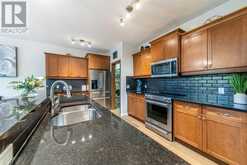 94 Aspen Hills Way SW Calgary