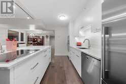 8406, 400 Eau Claire Avenue SW Calgary