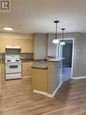 8119, 304 Mackenzie Way SW Airdrie