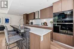 103, 128 Waterfront Court SW Calgary