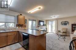 2311, 92 Crystal Shores Road Okotoks