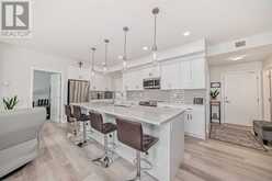 205, 360 Harvest Hills Way NE Calgary