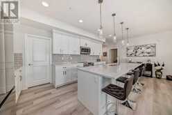 205, 360 Harvest Hills Way NE Calgary