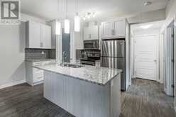 1703, 2461 Baysprings Link SW Airdrie