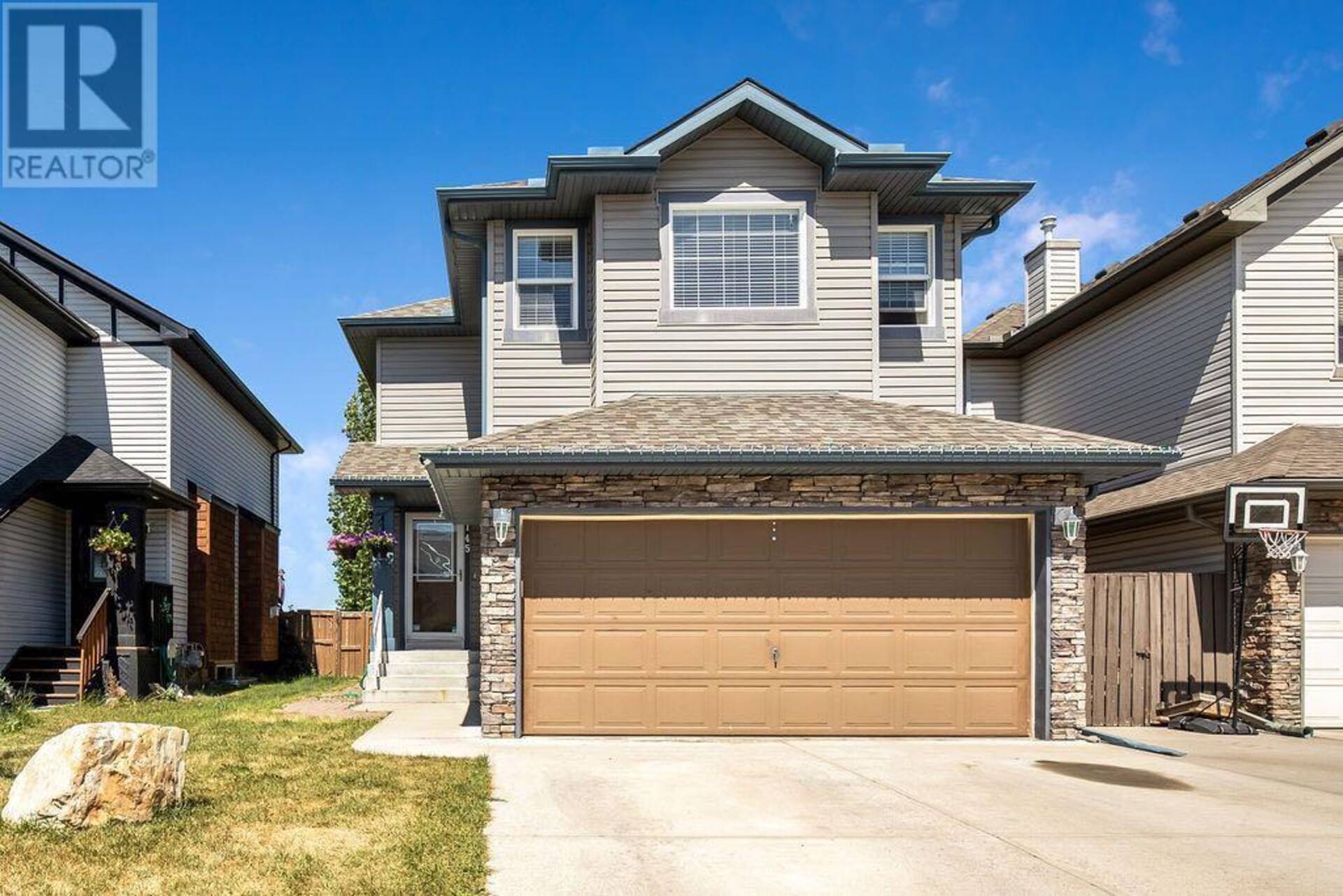 145 Crystal Shores Grove Okotoks