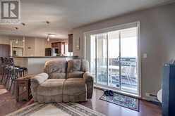 7413, 304 Mackenzie Way SW Airdrie