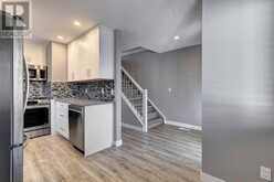 238 Woodmont Court SW Calgary