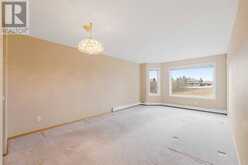 309, 3309 Hawksbrow Point NW Calgary