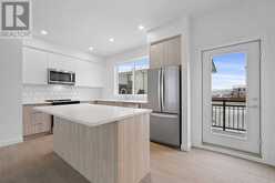 #208, 857 Belmont Drive SW Calgary