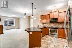 311, 35 Aspenmont Heights SW Calgary