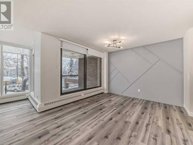 203, 145 Point Drive NW Calgary