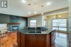 159 Cougarstone Court SW Calgary