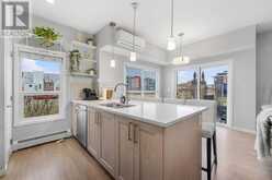 115, 4150 Seton Drive SE Calgary