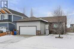 815, 800 Carriage Lane Place SW Carstairs