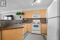 8327, 304 Mackenzie Way SW Airdrie