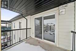 8406, 304 MACKENZIE Way SW Airdrie