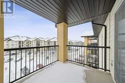 8406, 304 MACKENZIE Way SW Airdrie