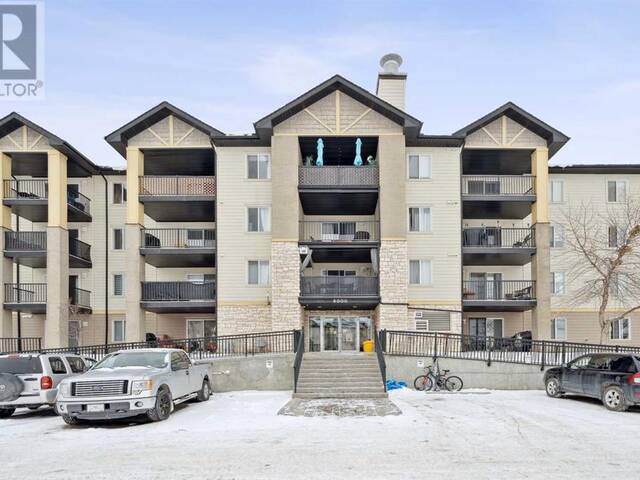 8406, 304 MACKENZIE Way SW Airdrie