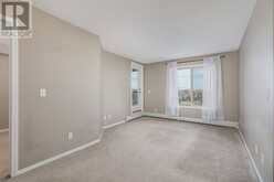 6205, 403 Mackenzie Way SW Airdrie