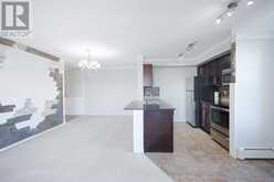 9416, 403 Mackenzie Way SW Airdrie