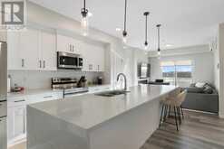 #210, 360 Harvest Hills Way NE Calgary