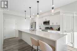 #210, 360 Harvest Hills Way NE Calgary